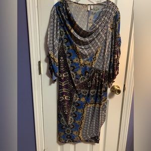 3qtr length sleeve Dress. Front has a piece that drapes open.